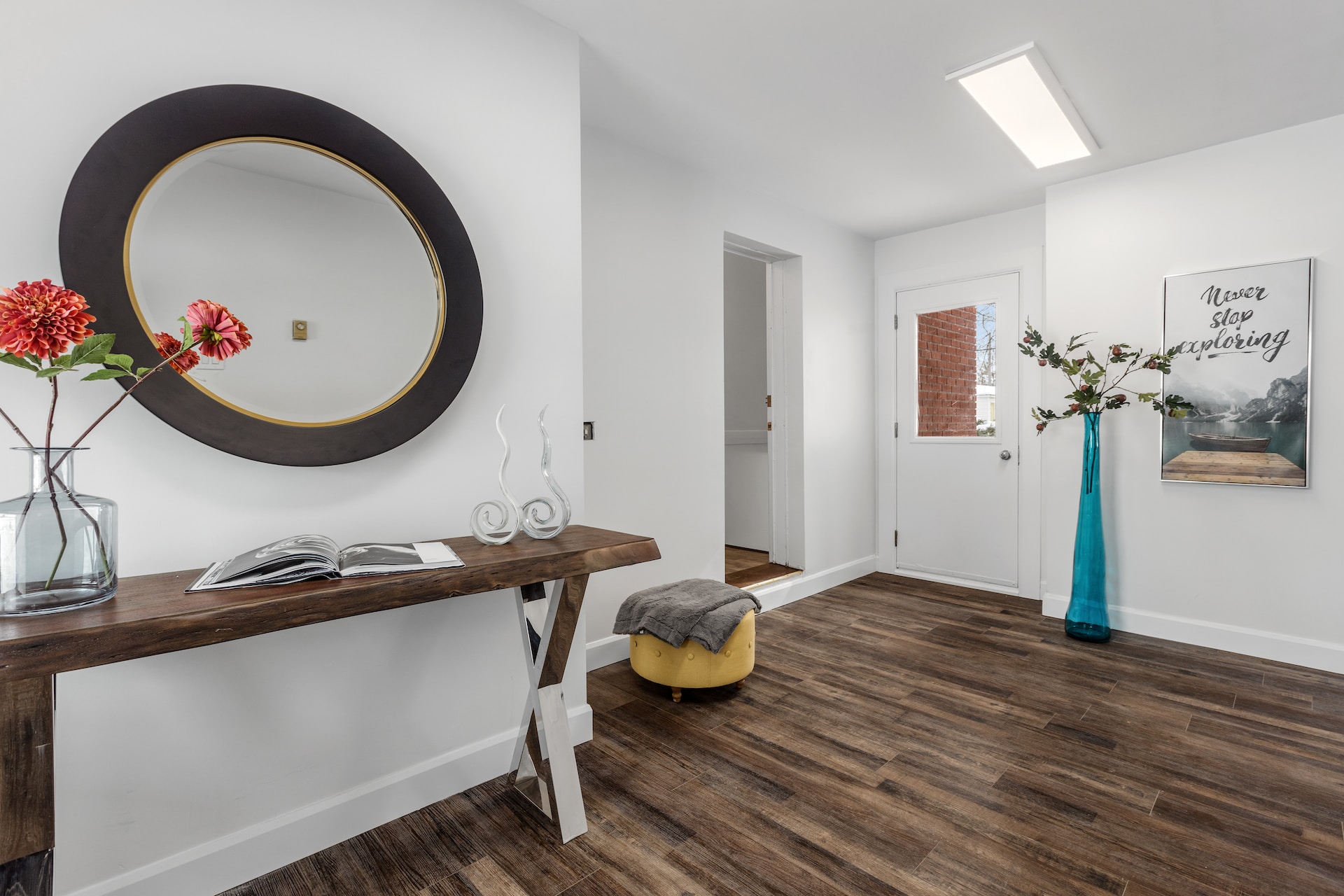 Dark brown Luxury vinyl tiles in a white-walled home